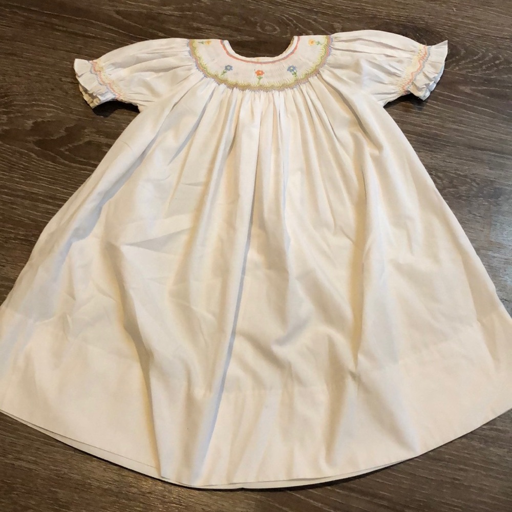 Little girls smocked dress.  Brand Sweet Angela